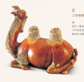 49三彩釉陶卧驼.jpg